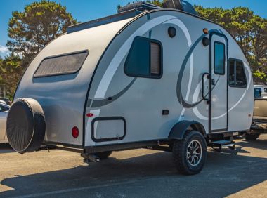 Travel Trailer with Insurance in a Bloomville, NY Parking Lot